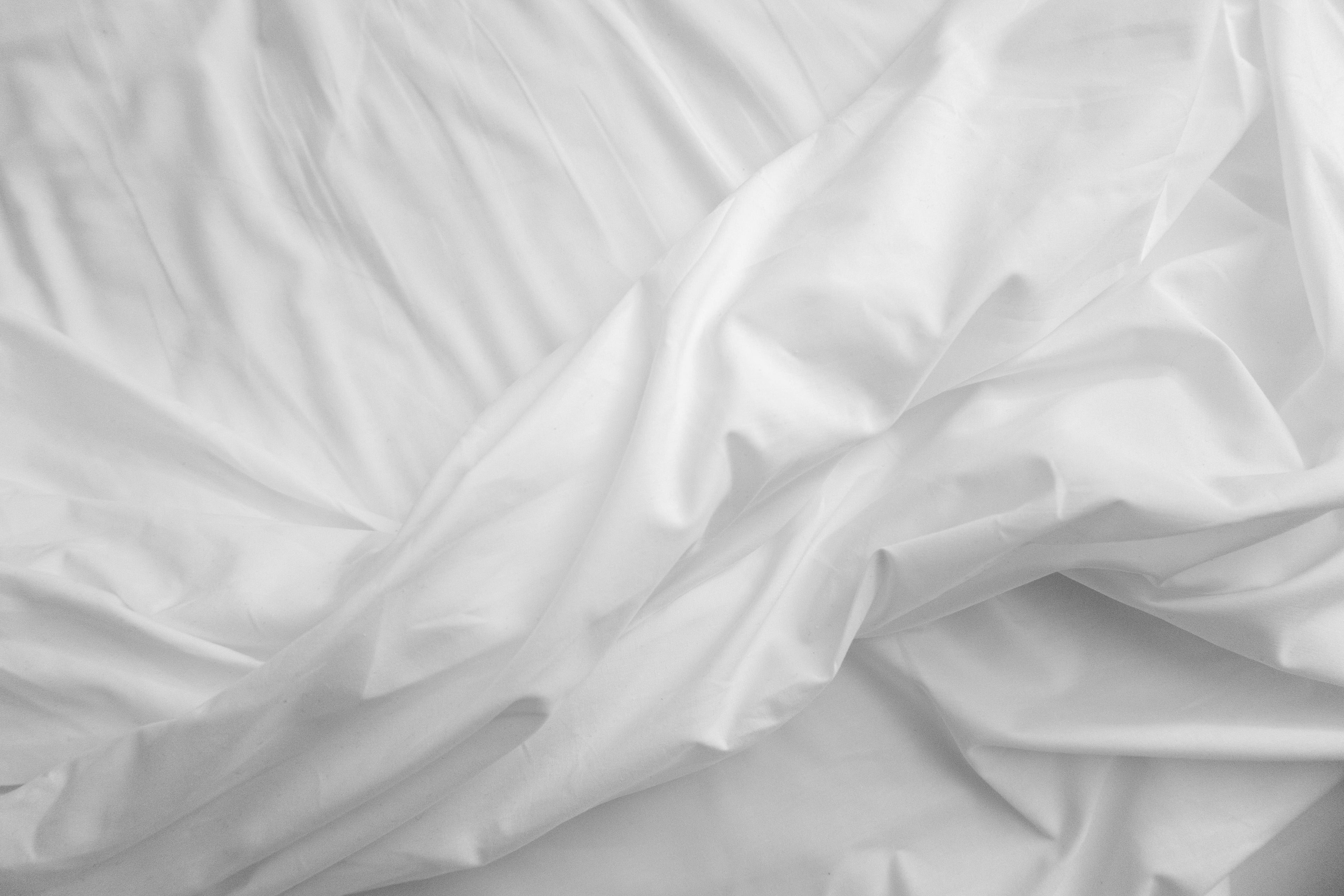 Is Satin Hot or Cool? What Satin Bedding Actually Does for Your Skin While You Sleep